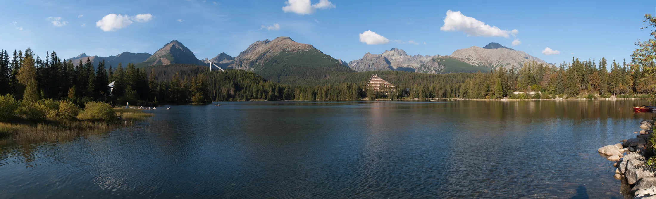 High Tatras reflected in the still water of Štrbské pleso, Slovakia